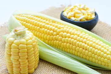  fresh organic corn in leaf, shelled and in pieces