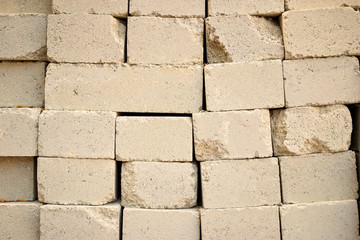 Concrete block bricks in stack for wall construction. 