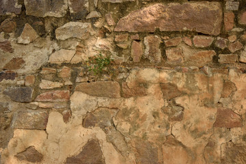 Pattern of Rough Grunge Vintage Stone Wall Texture light yellow Color Background