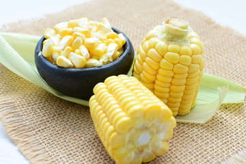  fresh organic corn in leaf, shelled and in pieces