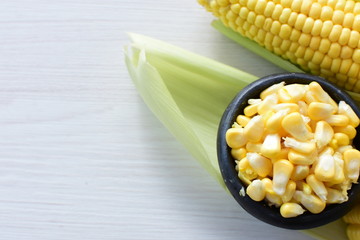  fresh organic corn in leaf, shelled and in pieces