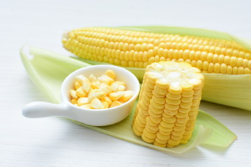  fresh organic corn in leaf, shelled and in pieces
