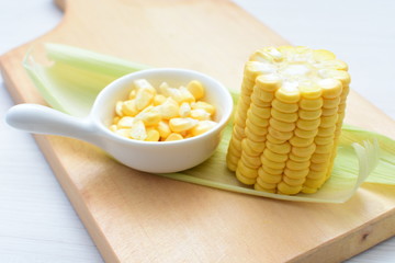  fresh organic corn in leaf, shelled and in pieces