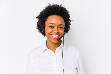 Young african american telemarketer woman isolated happy, smiling and cheerful.