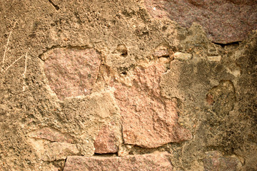 Pattern of Rough Grunge Vintage Stone Wall Texture light yellow Color Background