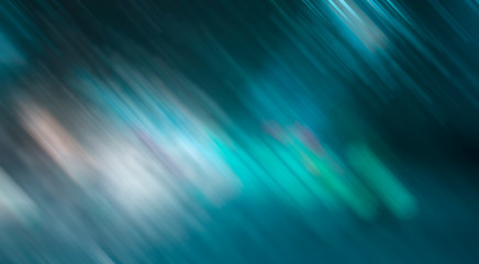 Fototapeta premium Abstract blurred night background. Blue stripes light bokeh