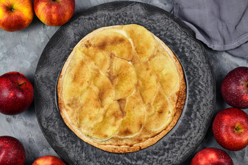 Sweet `Tarte Flambee` or `Flammkuchen` from German-French Alsace border region, a baked pie similar...