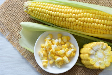  fresh organic corn in leaf, shelled and in pieces