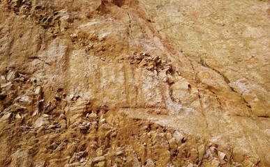 fractured volcanic rocks outcrop near the road