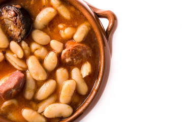 Typical Spanish fabada asturiana isolated on white background. Top view. Copy space