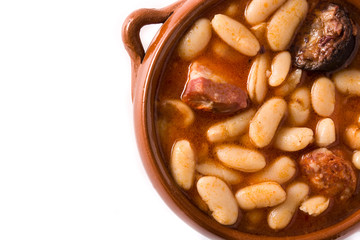 Typical Spanish fabada asturiana isolated on white background. Top view. Copy space