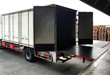 truck docking load cargo shipment at warehouse