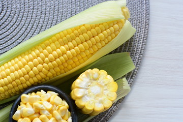  fresh organic corn in leaf, shelled and in pieces