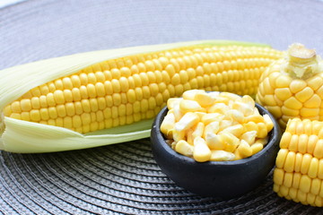  fresh organic corn in leaf, shelled and in pieces