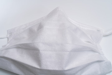 Protective medical mask on white background.