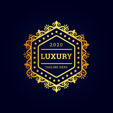 Vintage luxury hexagonal premium logo with golden Premium Vector
