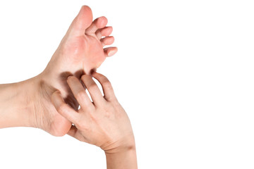 Woman hand scratching on feet isolated on white background for healthy concept.