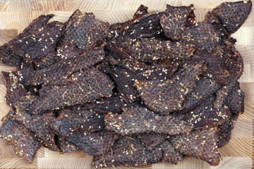 dried beef slices in spices with sesame seeds