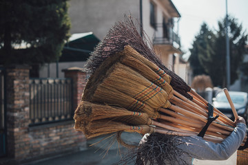 Broom Seller Walking The Streets