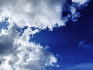 Beautiful clouds in the blue sky, azure stratosphere and spindrift, for background and texture.