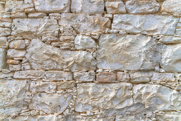 Fragment of an ancient stone wall in Cyprus, Background