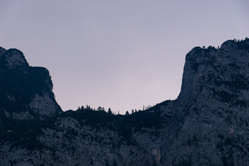 Fototapeta na wymiar Mountain Silhouette with clear blue sky at twilight