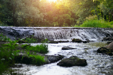 small waterfall in a city park