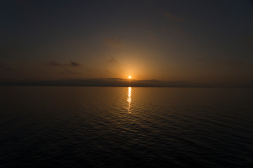 Naklejka na ściany i meble sunrise over the greek sea