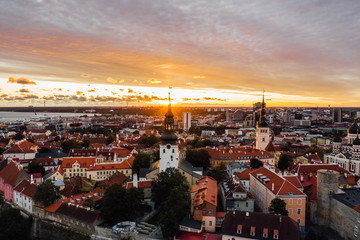 Fototapeta na wymiar Talinn, Estonia. Old town city aerial drone view during sunrise.