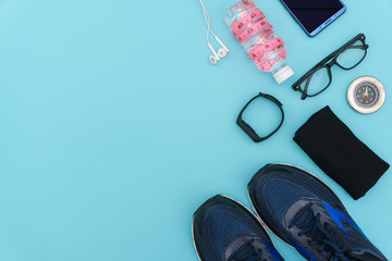 fitness stuffs against aqua background. health care conceptual images. flat lay. copy space