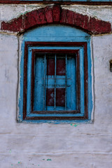 Fototapeta na wymiar old window in brick wall