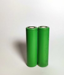 battery isolated on white background - obrazy, fototapety, plakaty