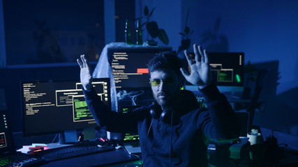 Startled computer hacker caught and arrested for breaking into security system. Act of internet and...
