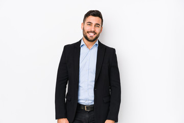 Young caucasian business man against a white background isolated happy, smiling and cheerful.