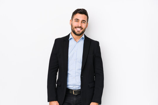 Young caucasian business man against a white background isolated happy, smiling and cheerful.