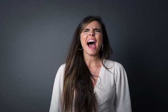 Stressful Hipster Woman Screams In Panic, Closes Eyes In Terror, Keeps Hands On Head, Finds Out Terrified News Or Disaster About Best Friend, Can't Believe It. People, Stress, Annoyance