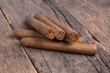 Cuban cigars on a wooden table
