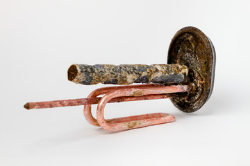 Clean heating element for heating water in domestic water heaters and boilers on white background....