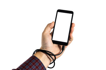 Phone charging cable tangled around the hand isoalted