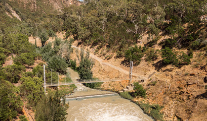 Disused ropelike bridge accross MT bold reservoir overflow, following recent damage, South Australia