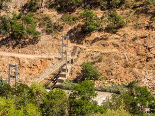 Disused ropelike bridge accross MT bold reservoir overflow, following recent damage, South Australia