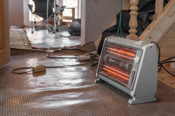 Repair in an unheated house. Floor heater works indoors.