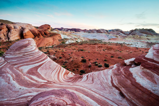 The Fire Wave is illuminated at sunset in Valley of Fire State Park, Nevada.
