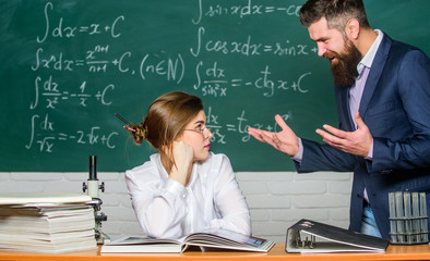 Conflict situation. School conflict. Demanding lecturer. Teacher strict serious bearded man having...
