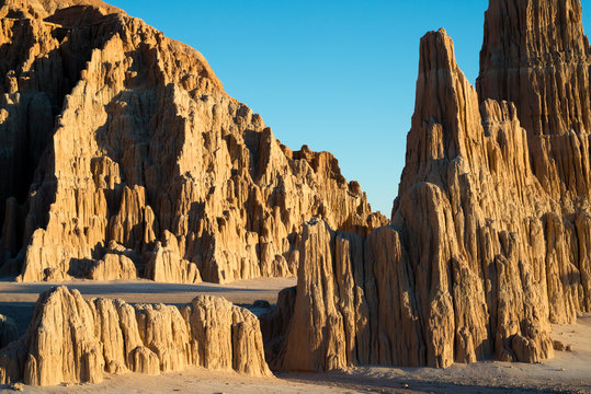 Odd clay formations are illuminated at sunset in Cathedral Gorge State Park near Pioche, Nevada.