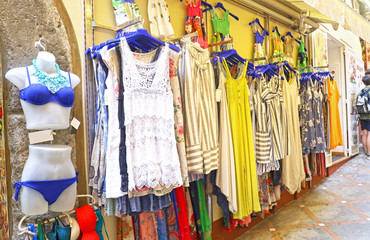 Colorful shops at Positano, Italy. Selling generic clothing, swim wear,  sun wear and souvenirs.