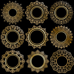 A collection of nine luxurious gold frames. Round frames on black background. Framing for photos, paintings, mirrors.  Element of design for invitation, title page, poster. Vector.