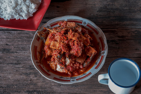 Balado Fried Fish, Padang Cuisine And Rice On Wooden Table