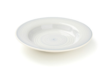 Blue clean plate isolated on white background. Kitchen, serving