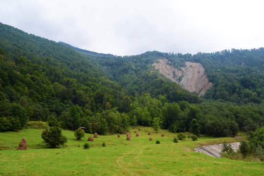 Rural landscape with haystacks in Ramnicu Valcea.